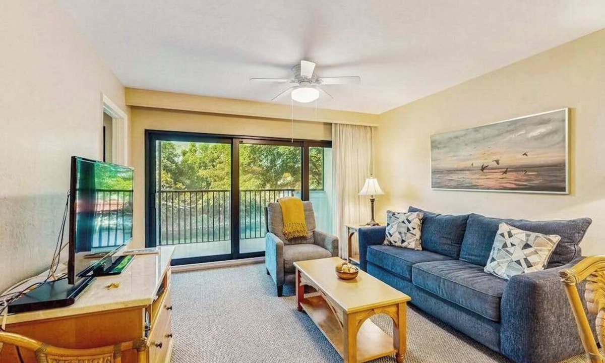 Park Shore Condo | Spacious, waterfront condo with outdoor pool, tennis, & volleyball