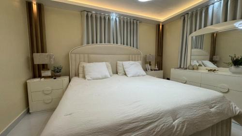 Punal Apartment | Beautiful Suite with BBQ Grill, Pool & Gym