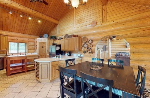 San Juan River Village Cabin | Beautiful Riverfront Log Cabin with Mountain Views, Firepit, and Gas Grill