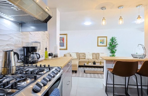 Gascue Villa | Charming 2-story Townhouse in Gazcue, with 2BR, 3 Queen beds & Serene Garden Retreat