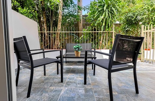 Gascue Villa | Charming 2-story Townhouse in Gazcue, with 2BR, 3 Queen beds & Serene Garden Retreat