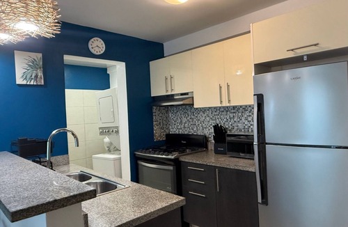 Yolanda Morales Apartment | Cozy 1-bedroom apartment in charming area of Piantini in Santo Domingo with AC,
