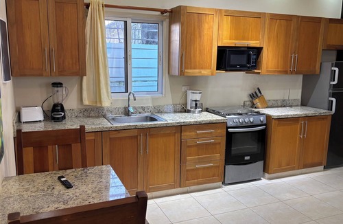 Villas Ana Maria Condo | Downtown Sosua One Bedroom Condo with onsite Bar and Cigar Lounge.
