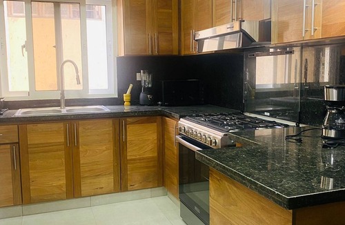 Urbanizacion Tavarez Apartment | Elegant 2BR/2BA condo: unwind by the pool. Guest-friendly, near all