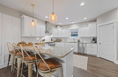 Topsail Beach House | Gemini Dream #102 - Soundfront w/Pool, Boat Dock, Elevator, Dogs Allowed!