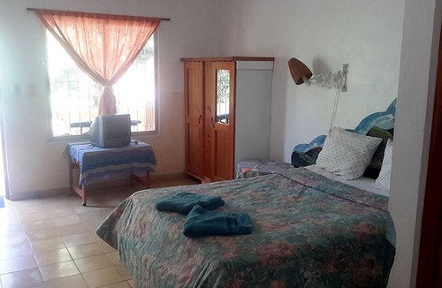 Los Charamicos Hotel | Guest-friendly budget room near Sosua beach