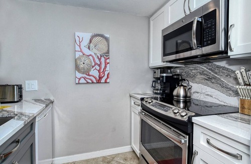 Longboat Key Apartment | LaPlaya 202E-Catch the gentle Gulf breezes on your private balcony!