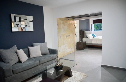 Villas Ana Maria Hotel | Luxury guest-friendly room in central Sosua, private bar, adults only