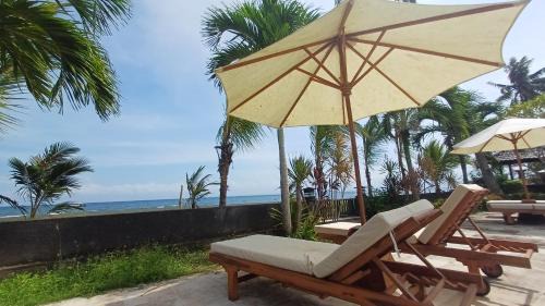 Melaya Bed & Breakfast | Melaya Beach Resort Queen Bed