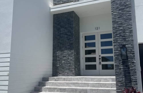 Isles of Capri House | Modern 4-bedroom house with pool/spa in Naples and minutes from Marco Island.