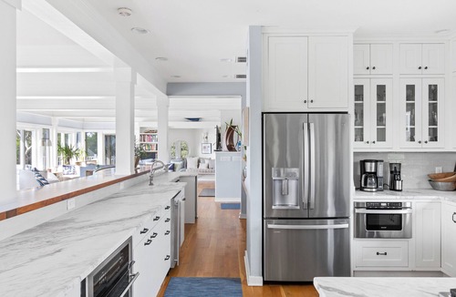 West Beach House | Poolside Paradise is luxury vacationing! Enjoy beautiful sunsets