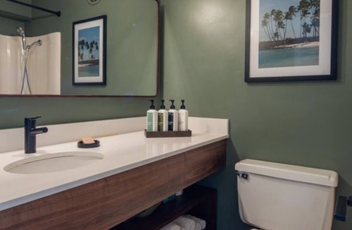 Historic Kailua Village Hotel | Soak, Stretch, Explore – Pool, Yoga & Bikes Ready for Your Island Days