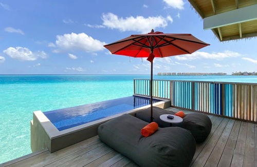 Farukolhufushi Island Hotel | Vibrant Vibes & Ocean Slides: Hard Rock Maldives Family Paradise