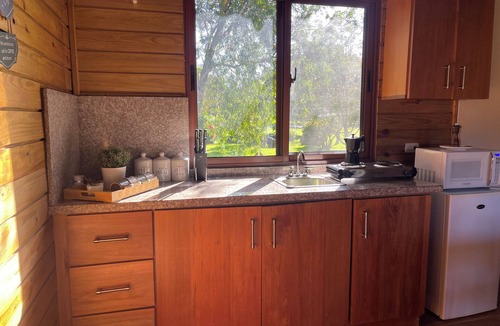 Urbanizacion Raul Ruiz Cabin | Wooden Nest Cabin: Cozy shelter/access to the river and swimming pool.