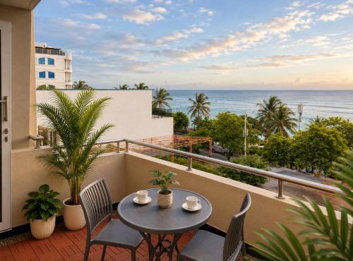 10-Min Airport Shuttle, 1-Min Beach, 2BR SeaView Terrace & SmartLock - Breezy Home