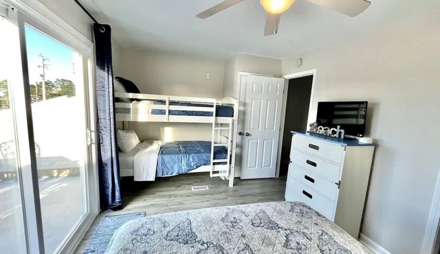 50 steps to beach 2 bed 3 bath townhome sleeps 8, close to restaurants and ent.