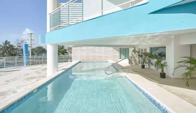 Cozy 2-bedroom apartment in enchanting Santo Domingo with AC, fitness room, WiFi