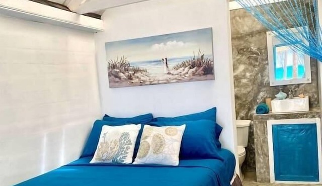 Cozy Beach Front bungalow #1. Unspoiled Beach.