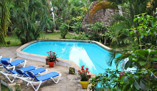 Hostel room with shared bathroom on tropical lagoon