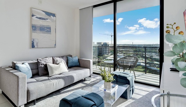 Modern 2BR Residence with open views & Balcony