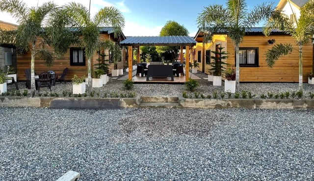 Relax & enjoy these peaceful & cozy cabin with outdoors, decks, patios, & pool