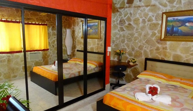 Room + yummy breakfast, steps from casino/beach, guest-friendly, pool/TV/WiFi