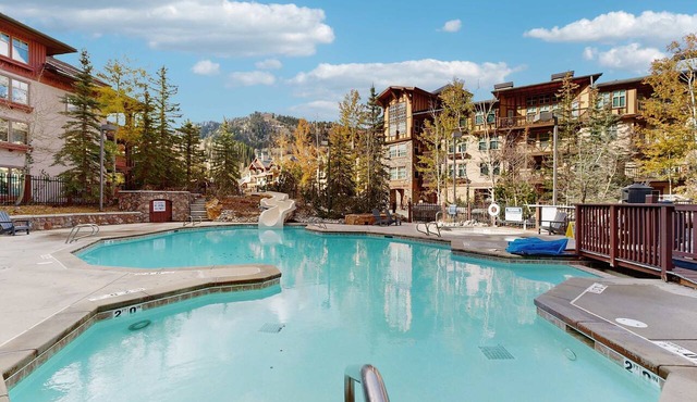 Ski-in - ski-out Powderhorn Condo with Shared Hot Tubs, a Pool & Gym at Club Solitude
