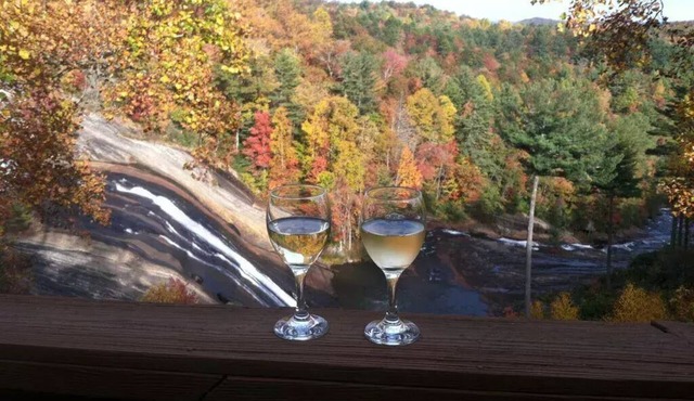 Stay directly above Toxaway Falls with breathtaking mountain views.
