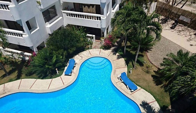 Top-floor guest-friendly apartment in Sosua, pool/parking/Wi-Fi/Cable TV
